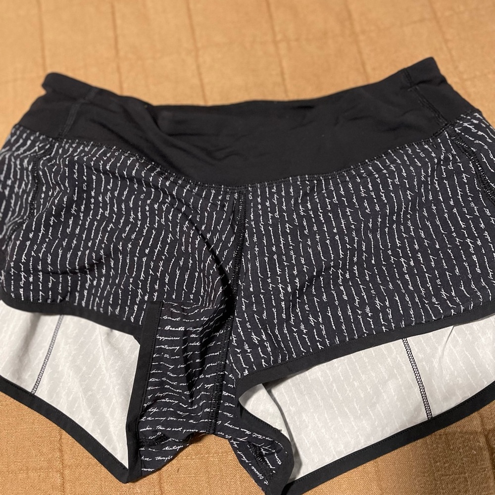 Lululemon shorts, black and white script size 6